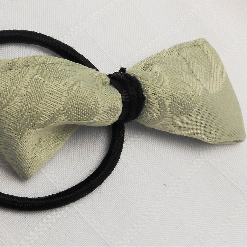 No35-36 : Two (2) bows on interchangeable rings for hairpins or elastic bands